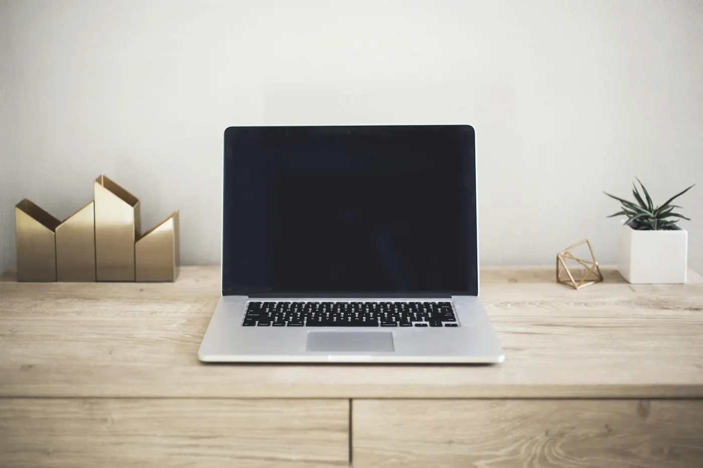 A laptop on a minimal workspace